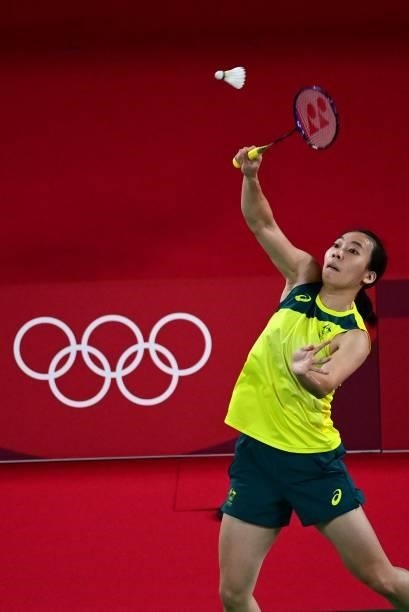 Australia's Wendy Chen Hsuan-yu hits a shot to Bulgaria's Linda Zetchiri in their women's singles badminton group stage match during the Tokyo 2020...