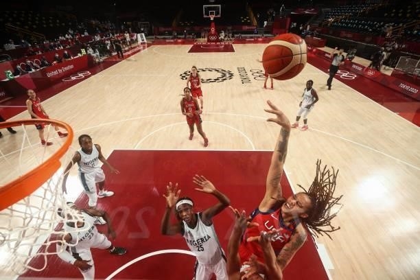 S Brittney Griner goes to the basket past Nigeria's Victoria Macaulay in the women's preliminary round group B basketball match between Nigeria and...