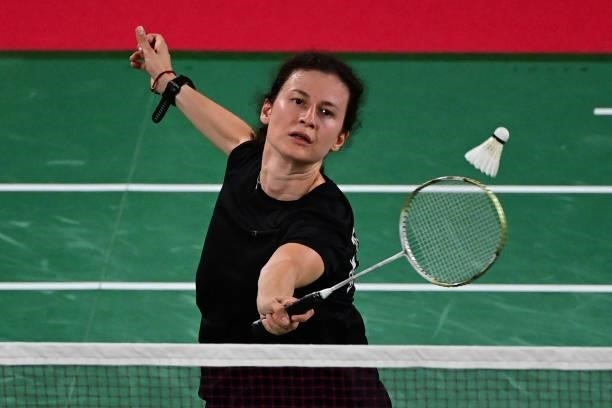 Bulgaria's Linda Zetchiri hits a shot to Australia's Wendy Chen Hsuan-yu in their women's singles badminton group stage match during the Tokyo 2020...