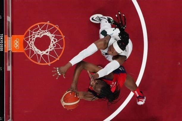 S Sylvia Fowles goes for the basket past Nigeria's Aisha Mohammed during the women's preliminary round group B basketball match between Nigeria and...