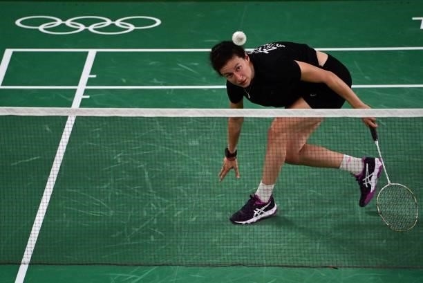Bulgaria's Linda Zetchiri hits a shot to Australia's Wendy Chen Hsuan-yu in their women's singles badminton group stage match during the Tokyo 2020...