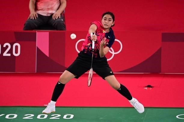 Myanmar's Thet Htar Thuzar hits a shot to Belgium's Lianne Tan in their women's singles badminton group stage match during the Tokyo 2020 Olympic...