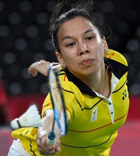 Belgium's Lianne Tan hits a shot to Myanmar's Thet Htar Thuzar in their women's singles badminton group stage match during the Tokyo 2020 Olympic...