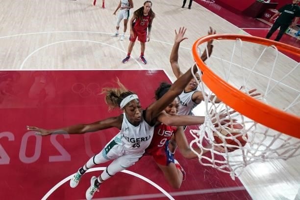 Nigeria's Victoria Macaulay tries to block USA's A'ja Wilson in the women's preliminary round group B basketball match between Nigeria and USA during...
