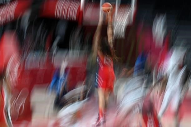 S Brittney Griner goes to the basket in the women's preliminary round group B basketball match between Nigeria and USA during the Tokyo 2020 Olympic...