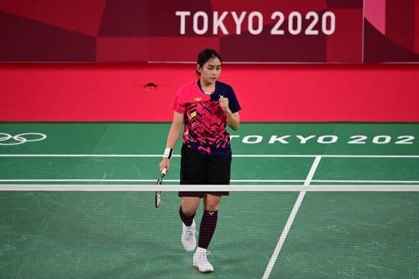Myanmar's Thet Htar Thuzar reacts between points with Belgium's Lianne Tan in their women's singles badminton group stage match during the Tokyo 2020...