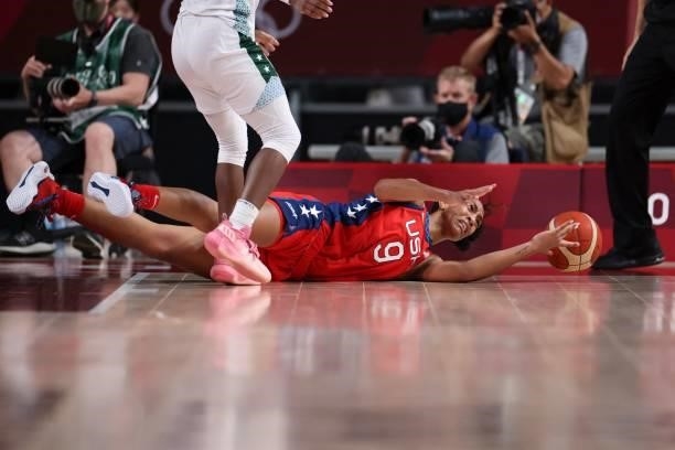S A'ja Wilson dives for the ball in the women's preliminary round group B basketball match between Nigeria and USA during the Tokyo 2020 Olympic...