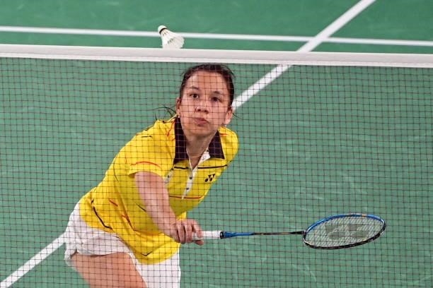 Belgium's Lianne Tan hits a shot to Myanmar's Thet Htar Thuzar in their women's singles badminton group stage match during the Tokyo 2020 Olympic...