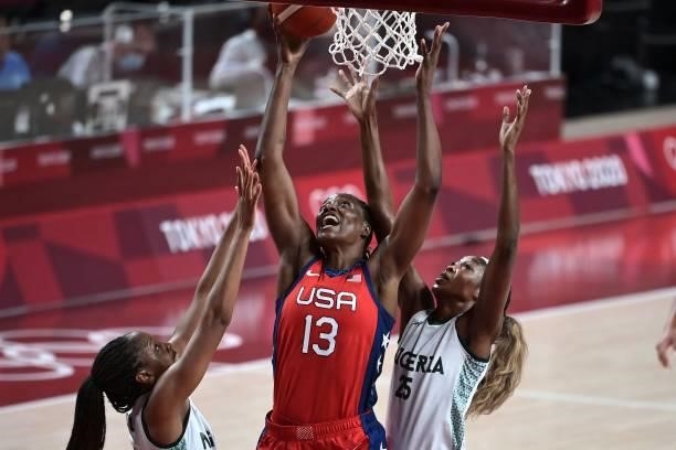 S Sylvia Fowles goes to the basket as Nigeria's Victoria Macaulay watches in the women's preliminary round group B basketball match between Nigeria...