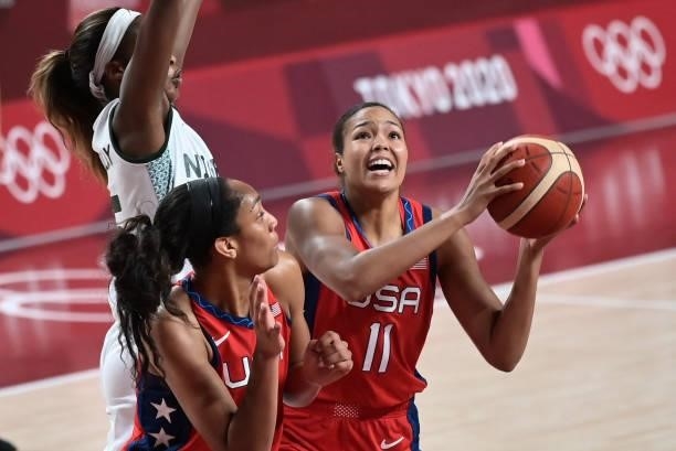 S Napheesa Collier handles the ball in the women's preliminary round group B basketball match between Nigeria and USA during the Tokyo 2020 Olympic...