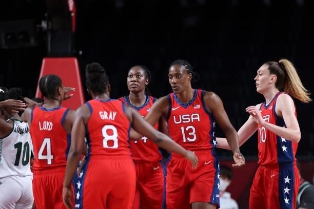 S player celebrate their victory at the end of the women's preliminary round group B basketball match between Nigeria and USA during the Tokyo 2020...