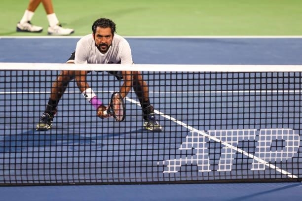 Aisam-Ul-Haq Qureshi of Pakistan gets ready for a return shot during a doubles match with Divij Sharan of India against Nick Kyrgios of Australia and...
