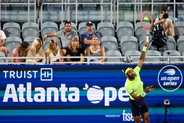 Fans look on as Divij Sharan of India serves during a doubles match with Aisam-Ul-Haq Qureshi of Pakistan against Nick Kyrgios of Australia and Jack...