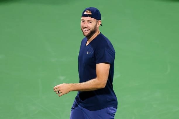 Jack Sock of the United States smiles during a doubles match with Nick Kyrgios of Australia against Aisam-Ul-Haq Qureshi of Pakistan and Divij Sharan...