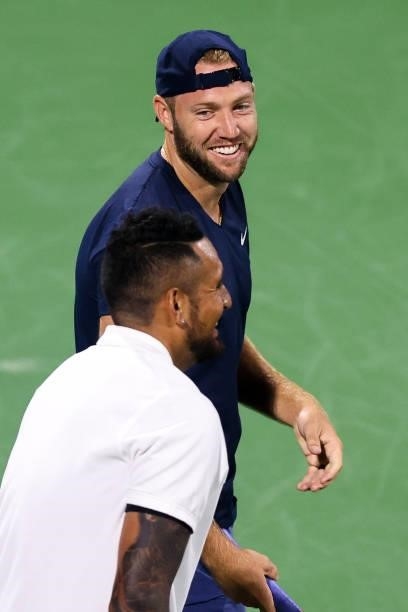 Jack Sock of the United States smiles during a doubles match with Nick Kyrgios of Australia against Aisam-Ul-Haq Qureshi of Pakistan and Divij Sharan...