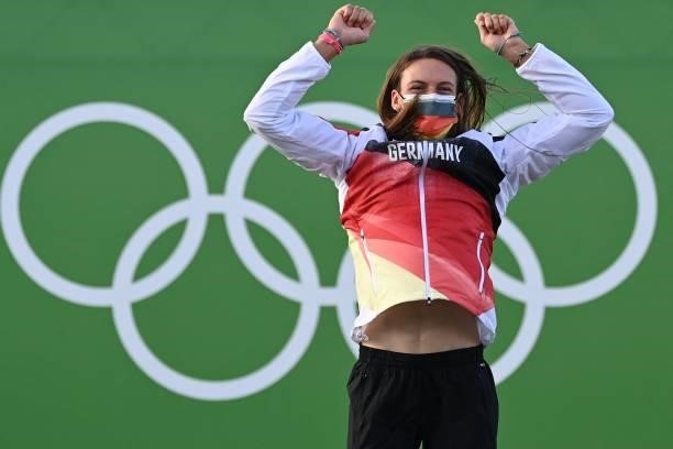 Germany's Ricarda Funk celebrates winning the gold medal on the podium following the women's Kayak final during the Tokyo 2020 Olympic Games at Kasai...
