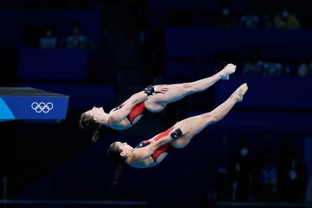 Meaghan Benfeito and Caeli Mckay of Team Canada compete during the Women's Synchronised 10m Platform Final on day four of the Tokyo 2020 Olympic...