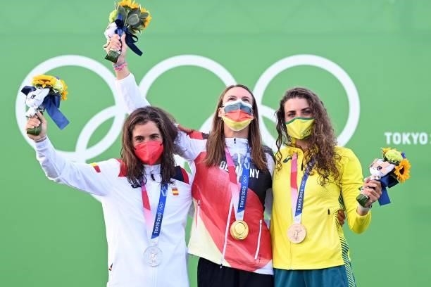 Spain's Maialen Chourraut , Germany's Ricarda Funk and Australia's Jessica Fox celebrate on the podium during the medal ceremony following the...