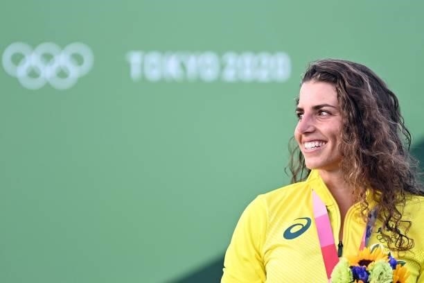 Australia's Jessica Fox poses with her bronze medal on the podium following the women's Kayak final during the Tokyo 2020 Olympic Games at Kasai...