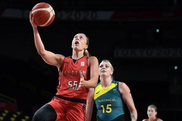 Belgium's Julie Allemand goes to the basket as Australia's Cayla George watches in the women's preliminary round group C basketball match between...