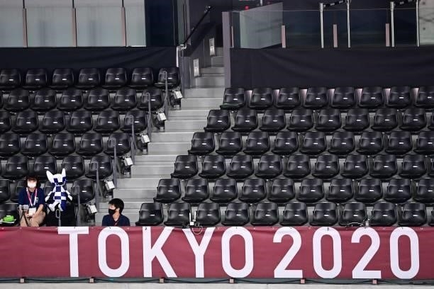 Empty seats are pictured in the arena during the badminton group stage matches at the Tokyo 2020 Olympic Games at the Musashino Forest Sports Plaza...