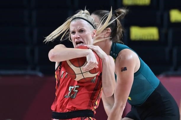 Belgium's Julie Allemand handles the ball in the women's preliminary round group C basketball match between Australia and Belgium during the Tokyo...