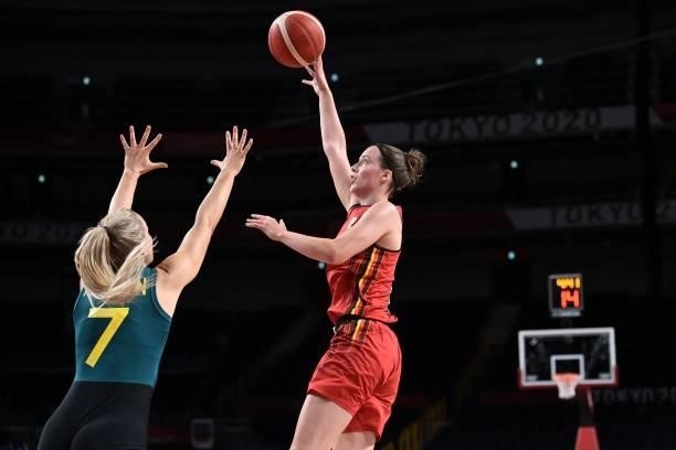 Belgium's Antonia Delaere shoots the ball as Australia's Tess Madgen tries to block in the women's preliminary round group C basketball match between...