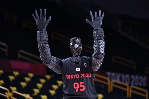 Basketball-playing robot named CUE plays basketball during half-time of the women's preliminary round group C basketball match between Australia and...