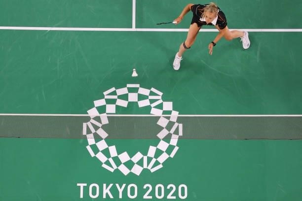 Netherlands' Selena Piek hits a shot next to Netherlands' Cheryl Seinen in their women's doubles badminton group stage match against Japan's Wakana...