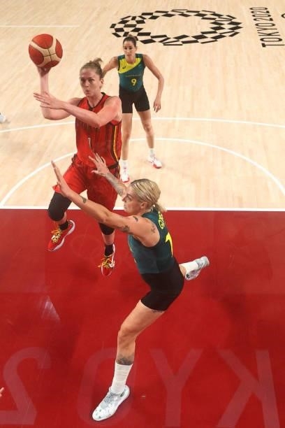 Belgium's Emma Meesseman goes to the basket past Australia's Cayla George in the women's preliminary round group C basketball match between Australia...