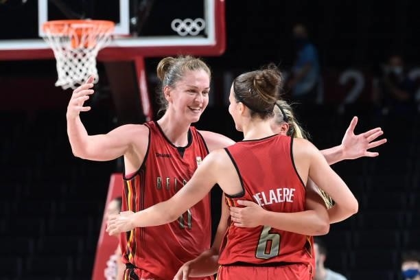 Belgium's players celebrate after their win in the women's preliminary round group C basketball match between Australia and Belgium during the Tokyo...