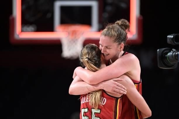 Belgium's Emma Meesseman celebrates with her teammate Julie Allemand after their win in the women's preliminary round group C basketball match...