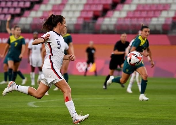 S defender Kelley O'Hara chases the ball during the Tokyo 2020 Olympic Games women's group G first round football match between USA and Australia at...