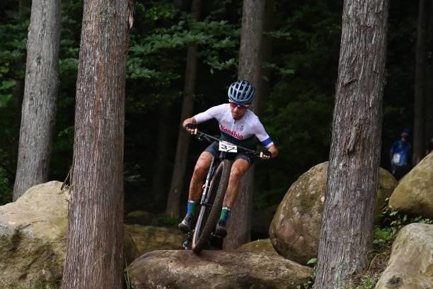 Namibia's Michelle Vorster rides in the cycling mountain bike women's cross-country race during the Tokyo 2020 Olympic Games at the Izu MTB Course in...