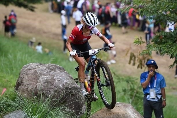 Switzerland's Jolanda Neff rides in the cycling mountain bike women's cross-country race during the Tokyo 2020 Olympic Games at the Izu MTB Course in...