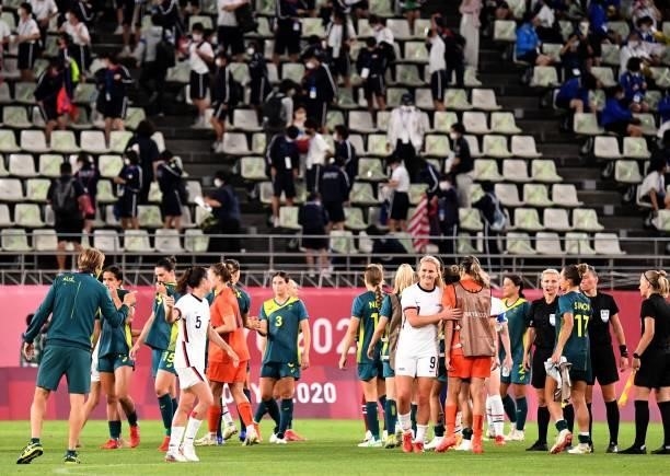 Australia and USA players congraturate each other after their Tokyo 2020 Olympic Games women's group G first round football match between USA and...