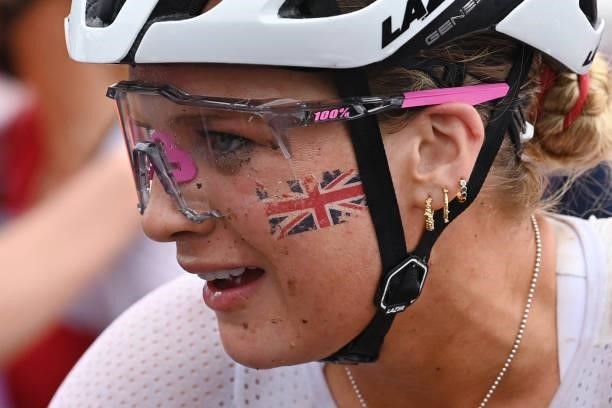 Britain's Evie Richards reacts after finishing the cycling mountain bike women's cross-country race during the Tokyo 2020 Olympic Games at the Izu...