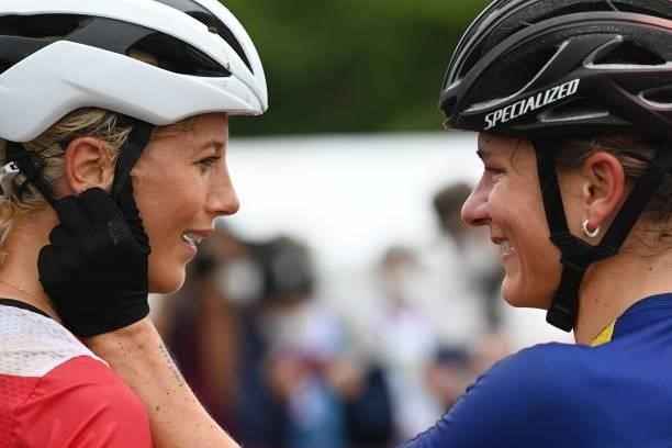 Sweden's Jenny Rissveds congratulates gold medallist Switzerland's Jolanda Neff after finishing the cycling mountain bike women's cross-country race...