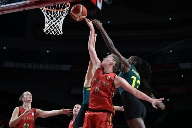 Australia's Ezi Magbegor goes to the basket as Belgium's Emma Meesseman tries to block in the women's preliminary round group C basketball match...