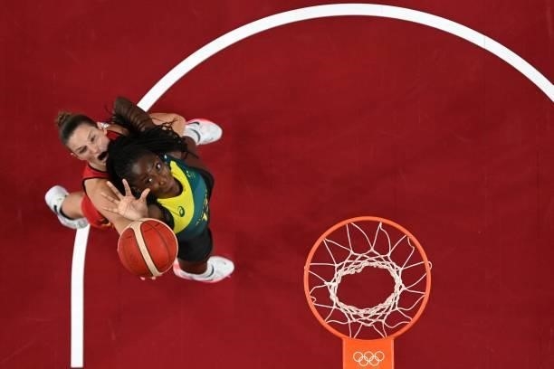 Australia's Ezi Magbegor and Belgium's Jana Raman look for the rebound in the women's preliminary round group C basketball match between Australia...