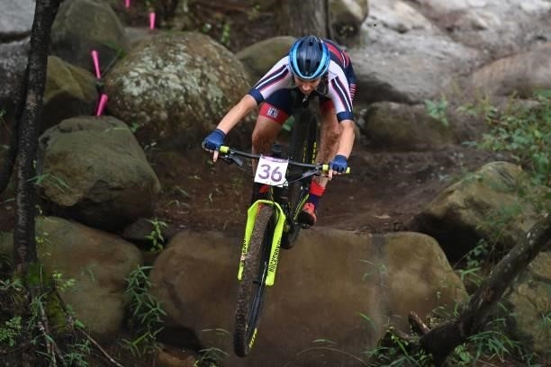 Russia's Viktoria Kirsanova rides in the cycling mountain bike women's cross-country race during the Tokyo 2020 Olympic Games at the Izu MTB Course...