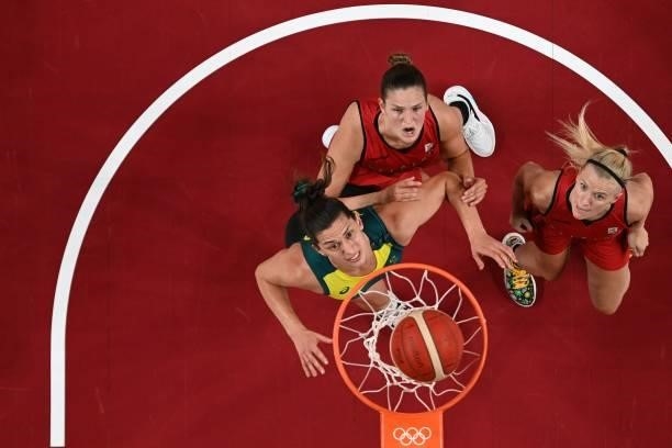 Belgium's Jana Raman and teammate Julie Vanloo look at the basket in the women's preliminary round group C basketball match between Australia and...