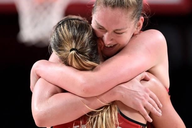 Belgium's Emma Meesseman celebrates with her teammate Julie Allemand after their win in the women's preliminary round group C basketball match...