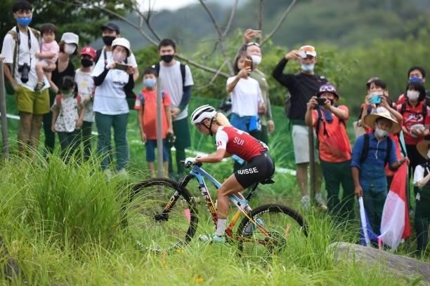 Switzerland's Jolanda Neff rides during the cycling mountain bike women's cross-country event during the Tokyo 2020 Olympic Games at the Izu MTB...