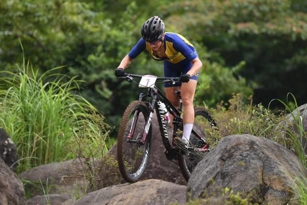 Sweden's Jenny Rissveds competes in the cycling mountain bike women's cross-country event during the Tokyo 2020 Olympic Games at the Izu MTB Course...