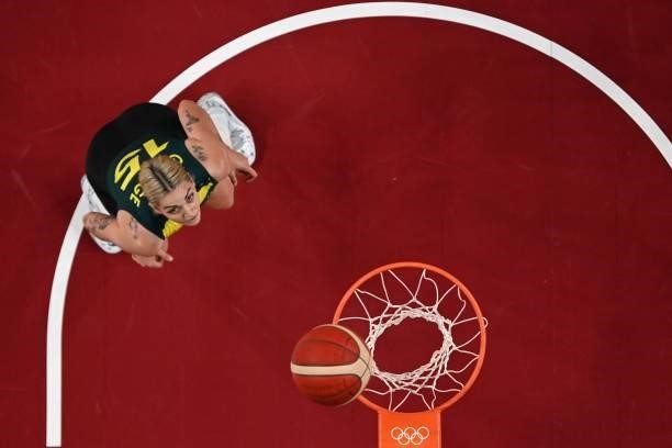 Australia's Cayla George looks at the basket in the women's preliminary round group C basketball match between Australia and Belgium during the Tokyo...