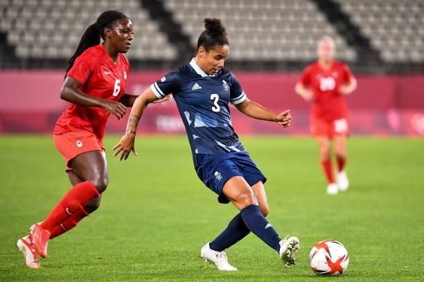 Britain's defender Demi Stokes controls the ball in front of Canada's forward Deanne Rose during the Tokyo 2020 Olympic Games women's group E first...