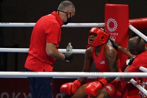S Oshae Lanae Jones is cooled off during a break as she fights Mexico's Brianda Tamara Cruz Sandoval during their women's welter preliminaries round...