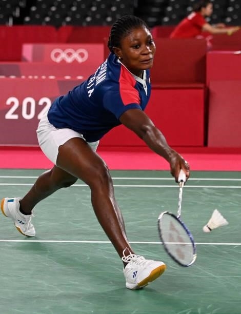 Nigeria's Dorcas Ajoke Adesokan hits a shot to South Korea's An Se-young in their women's singles badminton group stage match during the Tokyo 2020...