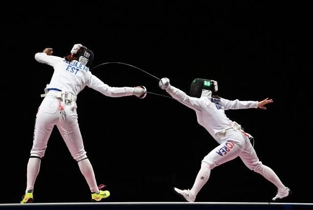 Estonia's Julia Beljajeva compete against South Korea's Kang Young Mi in the womens team epee gold medal bout during the Tokyo 2020 Olympic Games at...